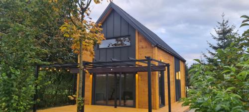 gmina Ludwin House | Discover Dom na Pojezierzu: Pet-Friendly, Oceanfront Retreat
