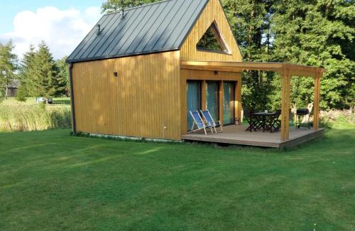 gmina Wielgie House | Experience Dom nad Stawem: Family-Friendly Oceanfront Retreat