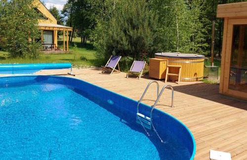 gmina Wielgie House | Experience Dom nad Stawem: Family-Friendly Oceanfront Retreat