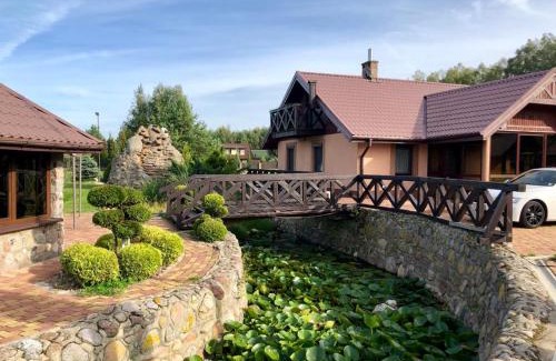 Dzialdowo Apartment | Tranquil Retreat: Dom nad stawem przy lesie with Pool & Hot Tub