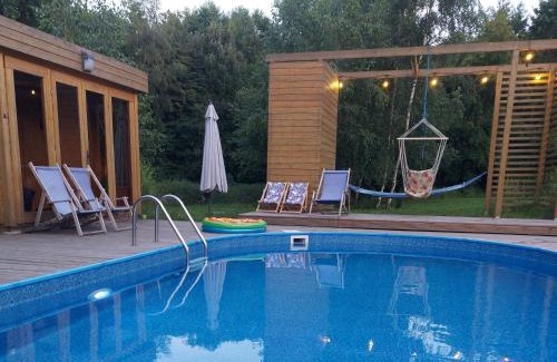 gmina Wielgie House | Scenic Retreat at Dom przy lesie with Oceanfront Amenities