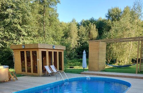 gmina Wielgie House | Scenic Retreat at Dom przy lesie with Oceanfront Amenities