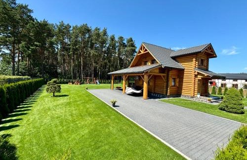 Karwienskie Bloto Drugie House | Exclusive Getaway at Dom Wakacyjny Złoto Północy, 9.8/10
