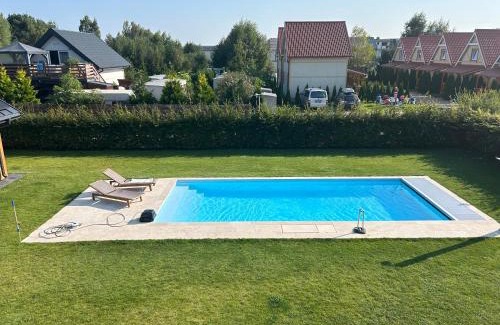 Debki House | Inviting Holiday Home with Pool and Ocean View
