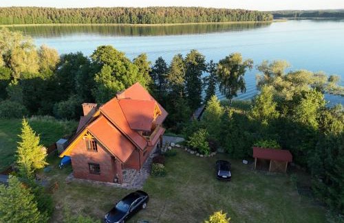 Ryn House | Ryn Lakefront Retreat in Mazury - Pet Friendly & Pool Access