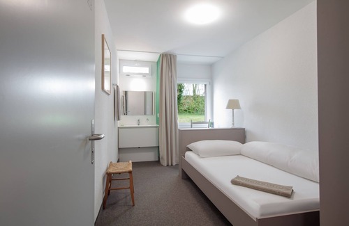 Villars-sur-Glane Cabin | Inviting Domaine NDR: Spa, Restaurant & Family Friendly