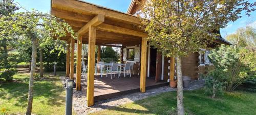 Orzysz House | Idyllic Domek Mazury: Oceanfront Escape at Jezioro Orzysz