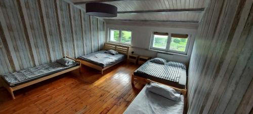 Małdyty Apartment | Relax at Domek nad jeziorem with Oceanfront Views