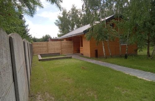Wilczogora Apartment | Relaxing Getaway at Domek nad Jeziorem with Ocean Views