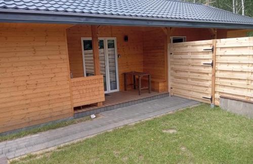 Wilczogora Apartment | Relaxing Getaway at Domek nad Jeziorem with Ocean Views