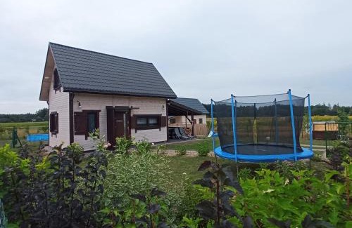 Uscimow Apartment | Discover Domek Tomaszne: Oceanfront Retreat with Hot Tub