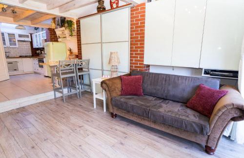 West Pomeranian Voivodeship Apartment | Cozy Retreat with Garden, PS4 & Netflix in a Quiet Area