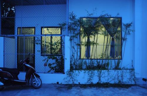 Vinh Hai Bed & Breakfast | Discover Domino Garden House: Perfect for Families & Pets