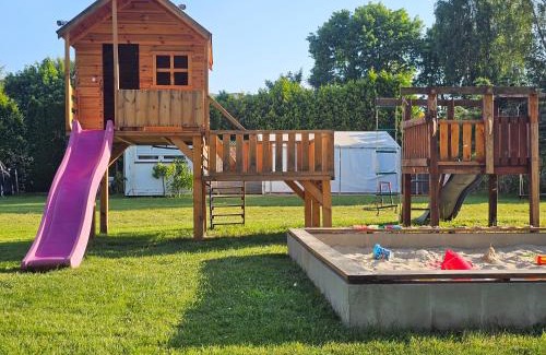 West Pomeranian Voivodeship Cabin | Pet-Friendly Domki Ajna Park: Perfect for Families!