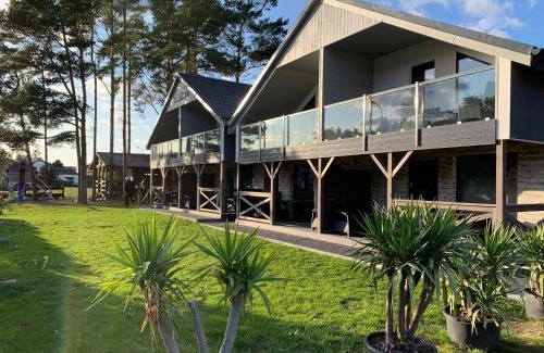 Ostrowo Cabin | Relax at Domki Albertówka - Oceanfront Retreat with Spa