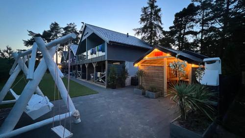 Ostrowo Cabin | Relax at Domki Albertówka - Oceanfront Retreat with Spa