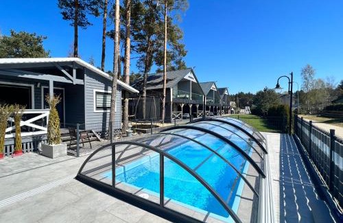 Ostrowo Cabin | Relax at Domki Albertówka - Oceanfront Retreat with Spa