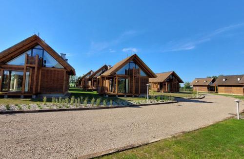 Gdow House | Discover Domki Kuter Port: Oceanfront Retreat with Pool