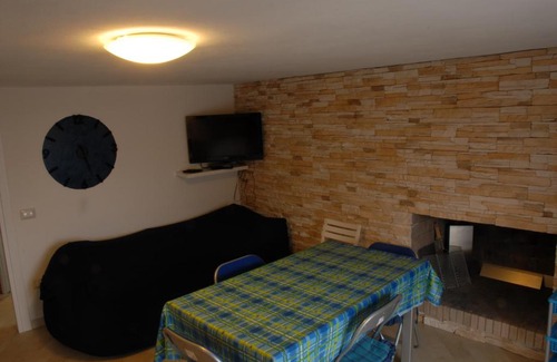 Torre dei Corsari Apartment | Domu Noa: Ocean View Retreat with Family-Friendly Amenities