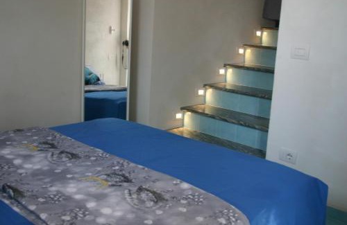 San Michele Apartment | Inviting Domus Julia: Oceanfront Retreat with Breakfast