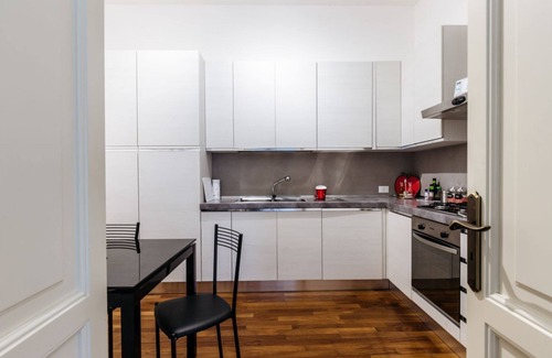 Kalsa Apartment | Experience Domus Sicily - Piazza Marina Suite with Garden Views