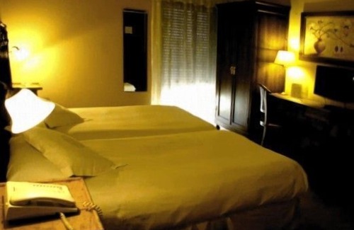San Juan Hotel | Discover Don Carlos Cáceres: Family-Friendly & Spa Amenities