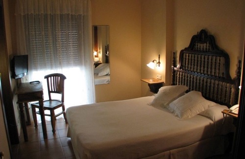 San Juan Hotel | Discover Don Carlos Cáceres: Family-Friendly & Spa Amenities