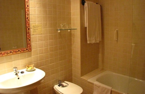 San Juan Hotel | Discover Don Carlos Cáceres: Family-Friendly & Spa Amenities