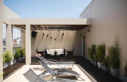 Corrientes Apartment | Explore DonSuites: Family-Friendly with a Pool & Breakfast