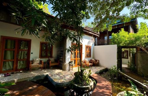 Sangkat Sla Kram Hotel | Discover Dontrei Villa Angkor: Oceanfront Bliss Awaits