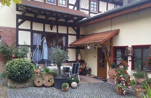 Oberaula Apartment | Relaxing Double Room with Sofa, Shared Facilities Await