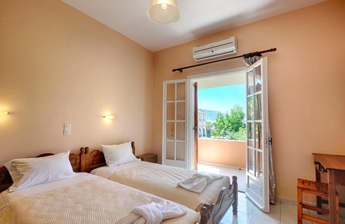 Agios Georgios Pagon Apartment | Dora Apartment 4 - in a quiet location only 300m from the sandy beach - in the bay of Agios Geo