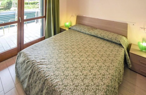 Lido di Volano House | Dora by Interhome: Oceanfront Stay with Spa & Breakfast