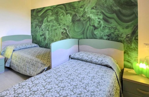 Lido di Volano House | Dora by Interhome: Oceanfront Stay with Spa & Breakfast
