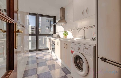 Huelva Apartment | Modern Two-Bedroom Retreat in Central Location with Garage