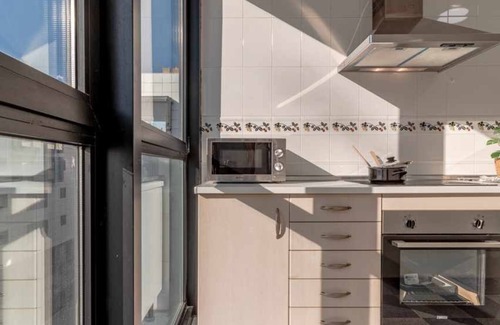 Huelva Apartment | Modern Two-Bedroom Retreat in Central Location with Garage