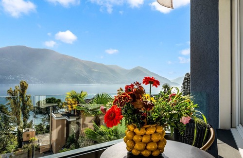 Ascona Apartment | Modern Double Room with Spa & Lake Views by Interhome
