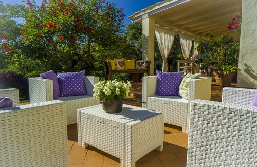 San Teodoro Apartment | Tranquil Double Room Surrounded by Lush Greenery