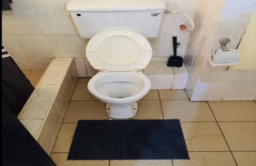 Accra Bed & Breakfast | Cozy Double Room with Balcony and Breakfast Included
