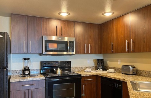 Enterprise Condo | Spacious Double Suite for Up to 8 Guests with Pool Access
