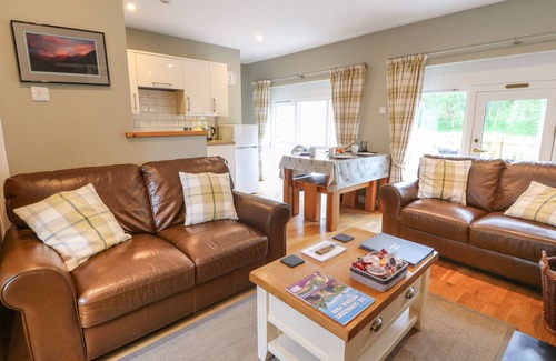 Newtonmore Cottage | DOUGLAS FIR, pet friendly, with open fire in Newtonmore