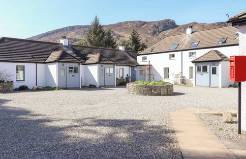 Newtonmore Cottage | DOUGLAS FIR, pet friendly, with open fire in Newtonmore