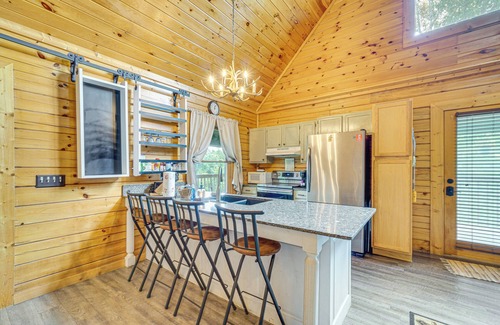 Sevierville Cabin | Charming Lakefront Cabin with Deck and Pool Access