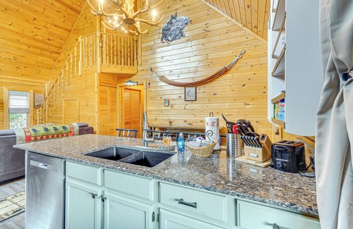 Sevierville Cabin | Charming Lakefront Cabin with Deck and Pool Access