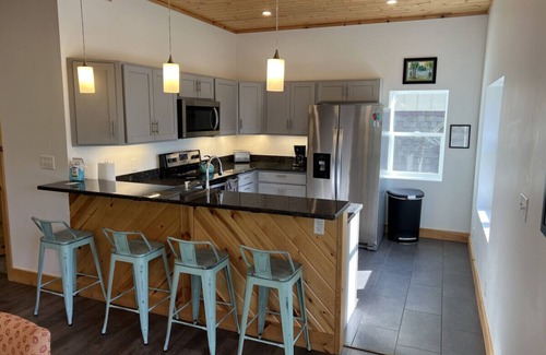Three Lakes Apartment | Premier Downtown Apartment with Breakfast & Family-Friendly Amenities