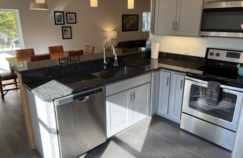 Three Lakes Apartment | Premier Downtown Apartment with Breakfast & Family-Friendly Amenities