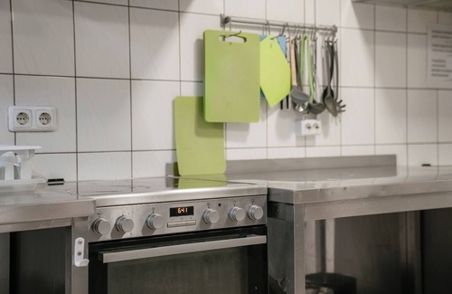 Uzupis House | Discover Downtown Forest Hostel with Family-Friendly Amenities