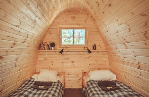 Uzupis House | Discover Downtown Forest Hostel with Family-Friendly Amenities
