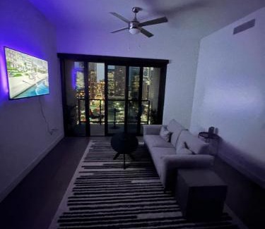 Midtown Apartment | Elegant Downtown Highrise with Pool & Kitchen Amenities