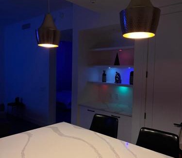 Midtown Apartment | Elegant Downtown Highrise with Pool & Kitchen Amenities